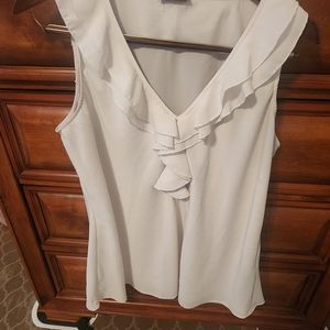 Cream sleeveless blouse